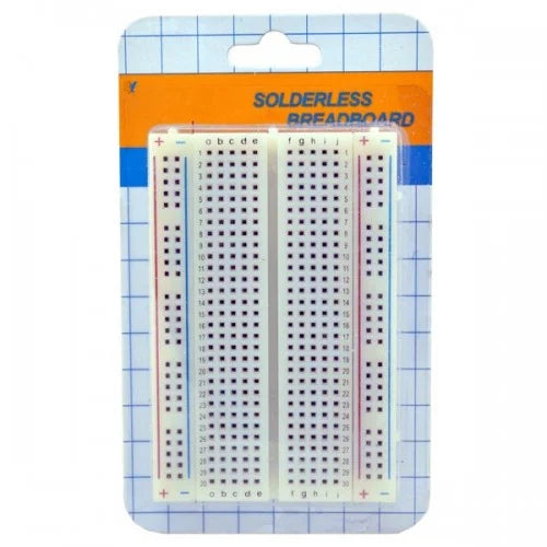 Solderless breadboard in packaging with grid pattern