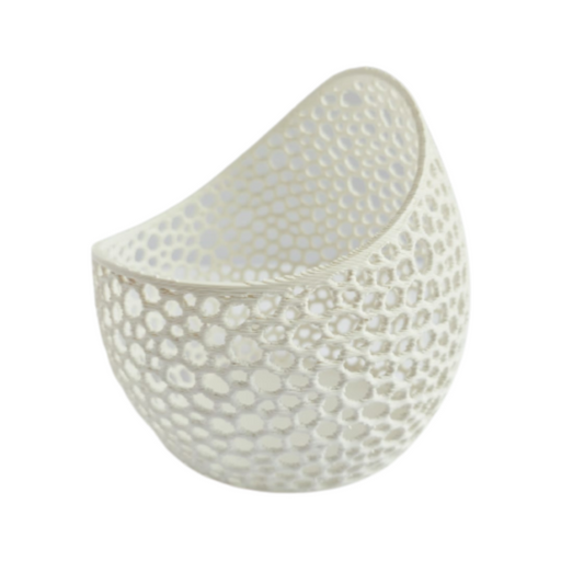 Decorative ceramic bowl with textured surface on a white background