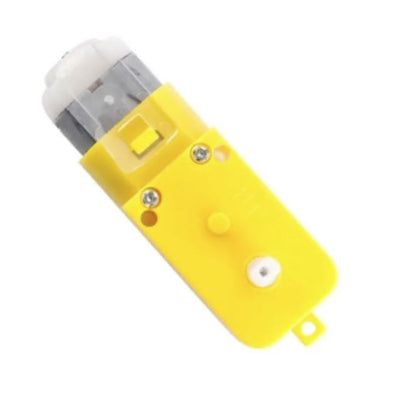 Yellow electronic device with a white top on a white background