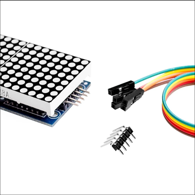 Microcontroller board with connectors and a rainbow-colored cable on a white background