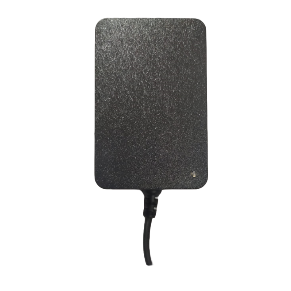 Black rectangular heating pad with a power cord on a white background