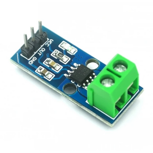 Electronic component board with blue surface and green terminal block on a white background