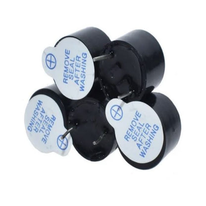 Black plastic components with white labels on a white background