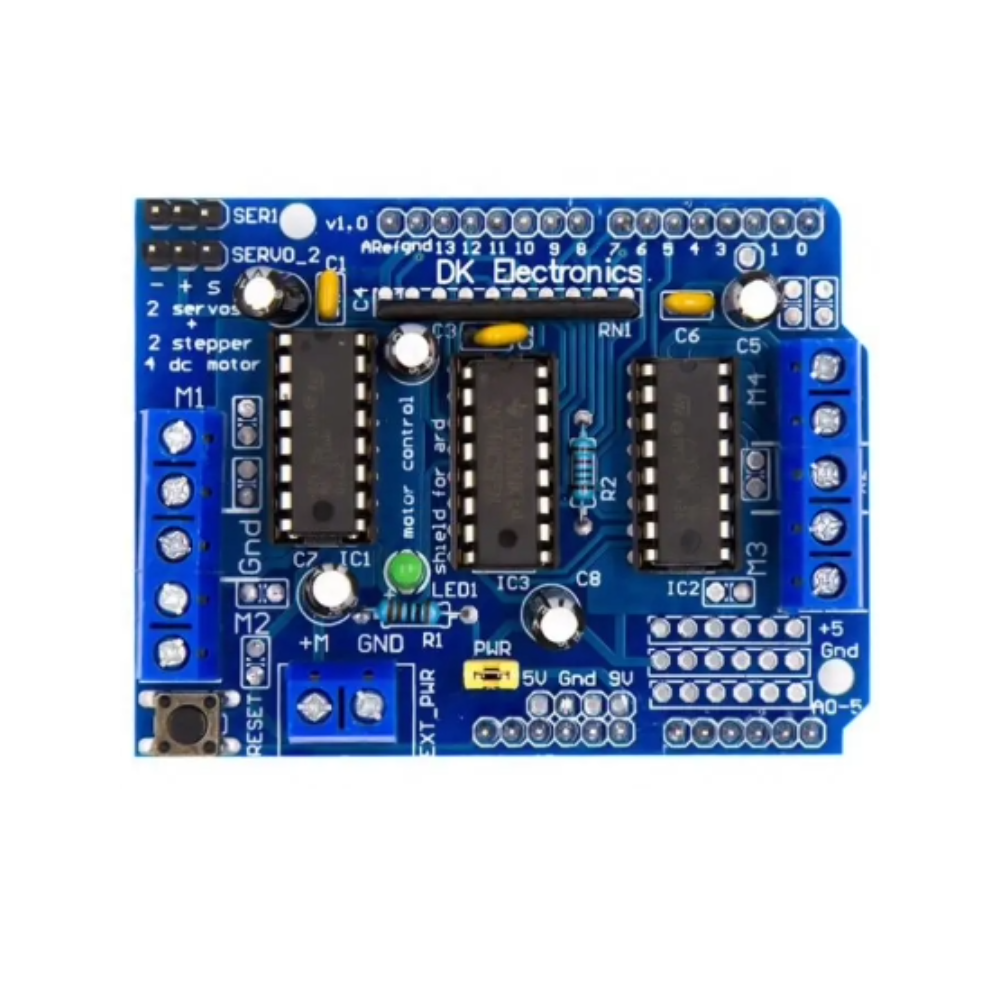 Blue electronic circuit board with various components on a white background
