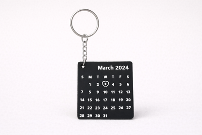 Calendar keychain for March 2024 on a white background