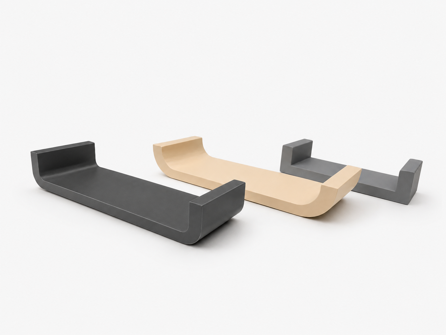 Two shelves, one black and one beige with a gray bracket, on a white background.