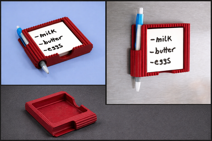 Red magnetic whiteboard with pen holder on a gray surface