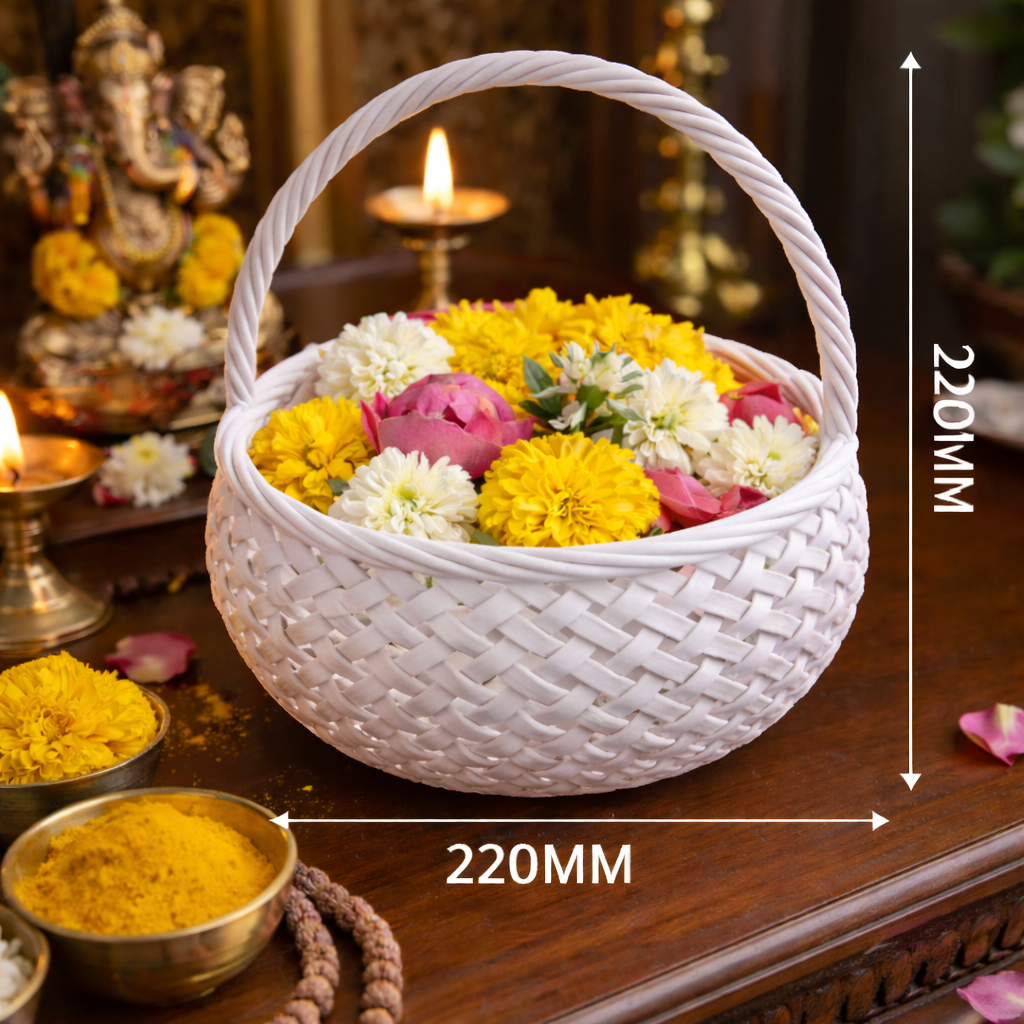 White woven basket with flowers on a wooden table, surrounded by religious items.