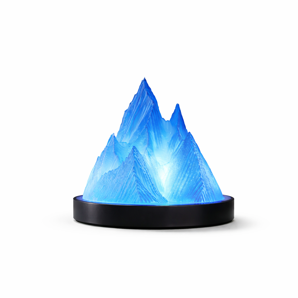 Mountain-shaped LED lamp with blue light on a white background