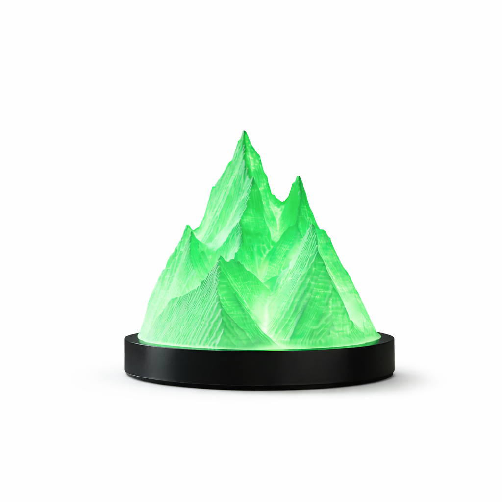 Green mountain-shaped lamp on a white background