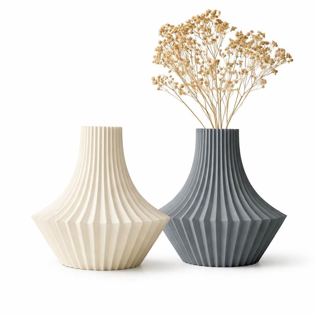 Two ribbed vases, one beige and one gray, with dried flowers on a white background.