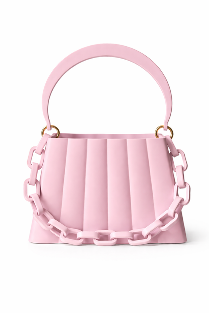 Pink handbag with chain details on a white background