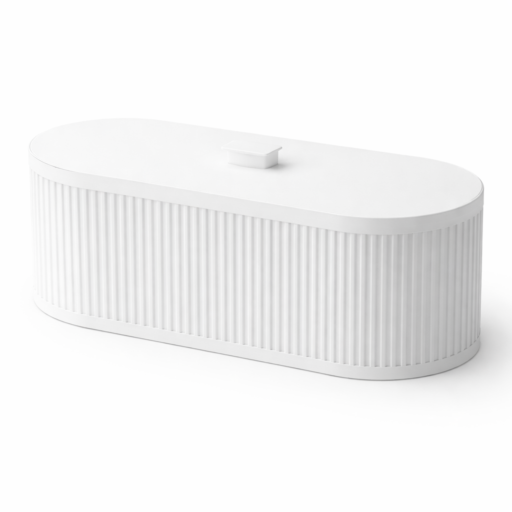 White ceramic bathtub with ribbed texture on a white background
