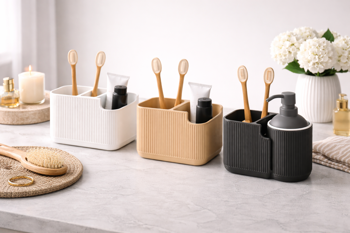 Set of three bathroom organizers with toothbrushes and toiletries on a light surface.