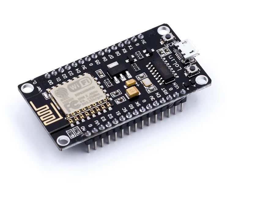 Electronic microcontroller board with various components on a white background