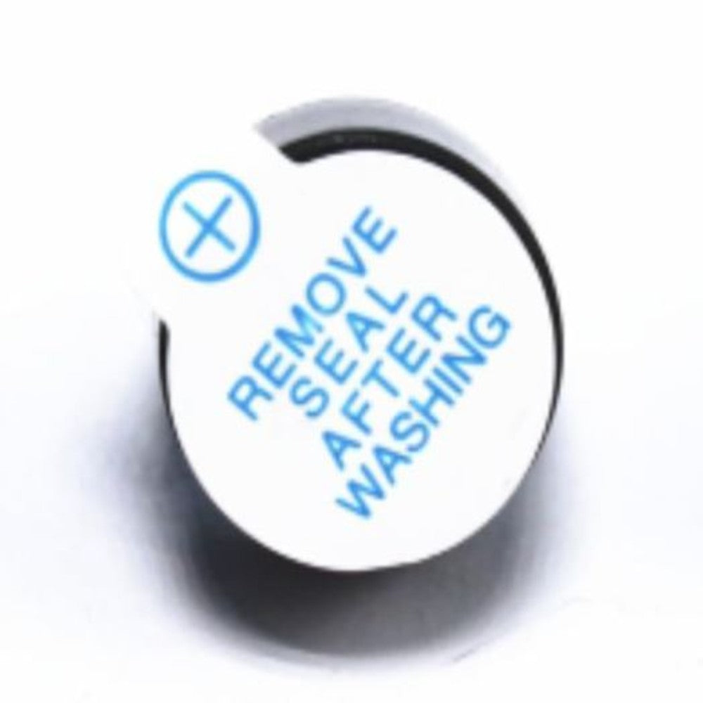 Round white label with blue text 'REMOVE SEAL AFTER WASHING' on a white background