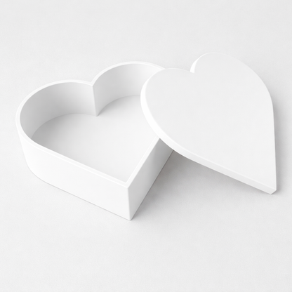 Two white heart-shaped boxes on a light gray background