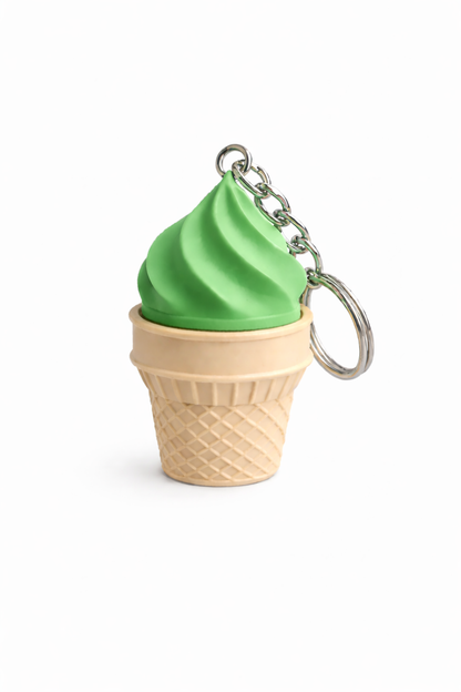 Green ice cream cone keychain on a white background