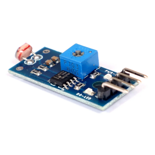 Electronic circuit board with blue component on a white background