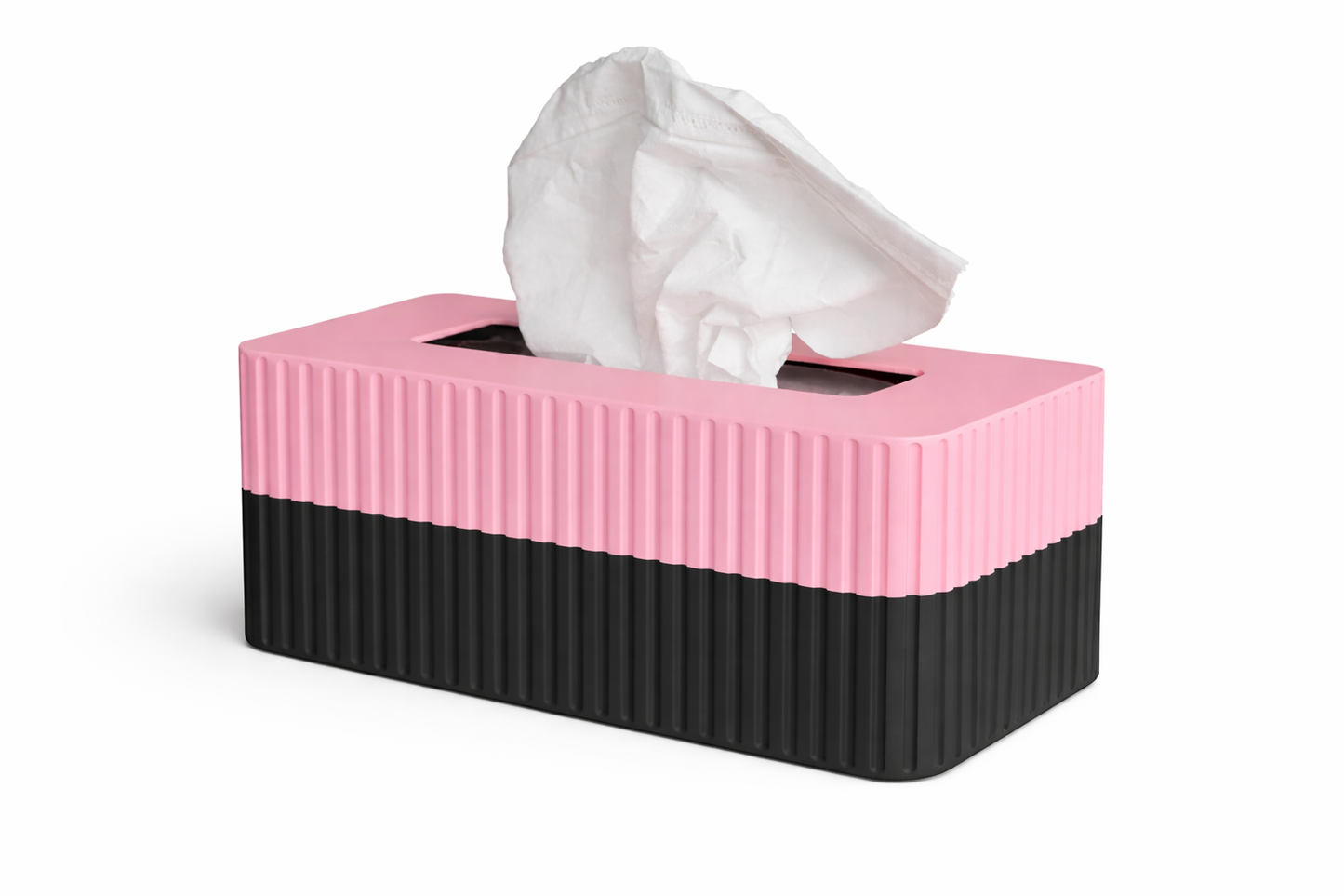 Pink and black tissue box with tissues on a white background