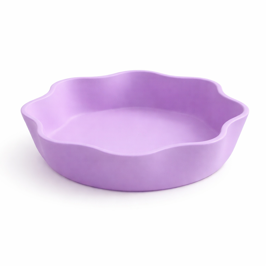 Purple ceramic dish on a white background