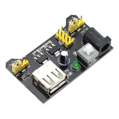 Electronic circuit board with various components on a white background
