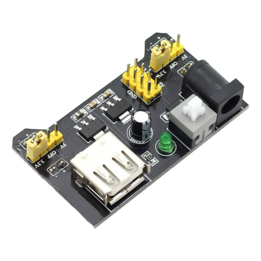 Electronic circuit board with various components on a white background