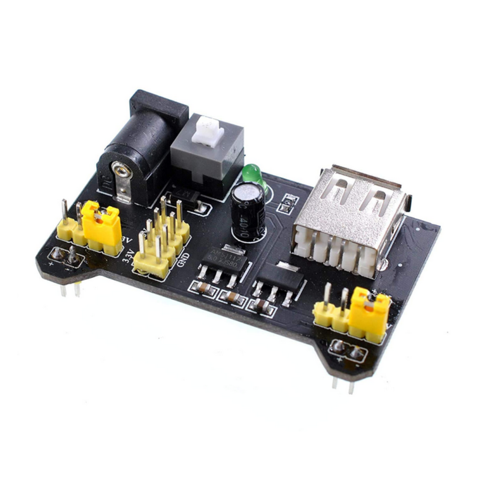 Electronic circuit board with various components on a white background