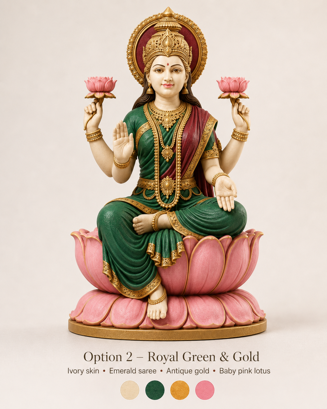 A decorative statue of a seated Hindu goddess on a pink lotus pedestal, shown against a plain light beige background. The statue has ivory skin, a green sari, gold jewelry and trim, and holds pink lotus flowers.