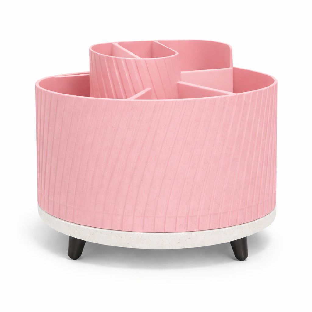 Pink cylindrical organizer with multiple compartments on a white background