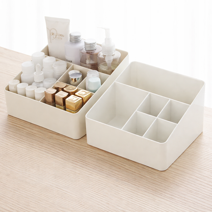 White cosmetic organizer with various items on a light wooden surface
