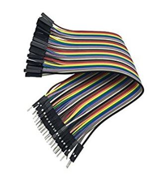 Set of multicolored ribbon cables with black connectors on a white background