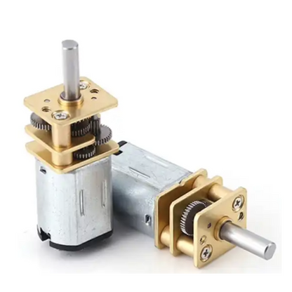 Two mechanical gear motors on a white background