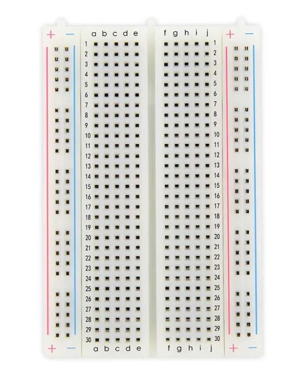Solderless breadboard with labeled rows and columns on a white background