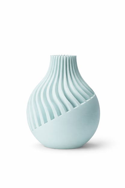Light blue textured vase on a white background