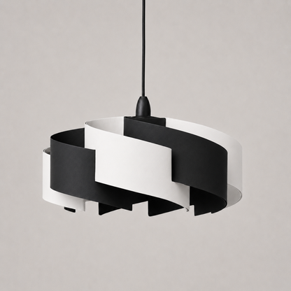 Modern black and white pendant light on a neutral background