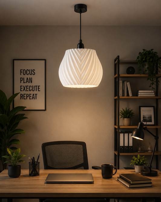 Modern office setup with a pendant light, desk, chair, and bookshelf.
