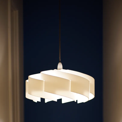 Modern pendant light fixture on a dark background