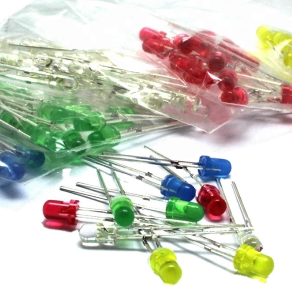 Assorted colored LED bulbs on a white background
