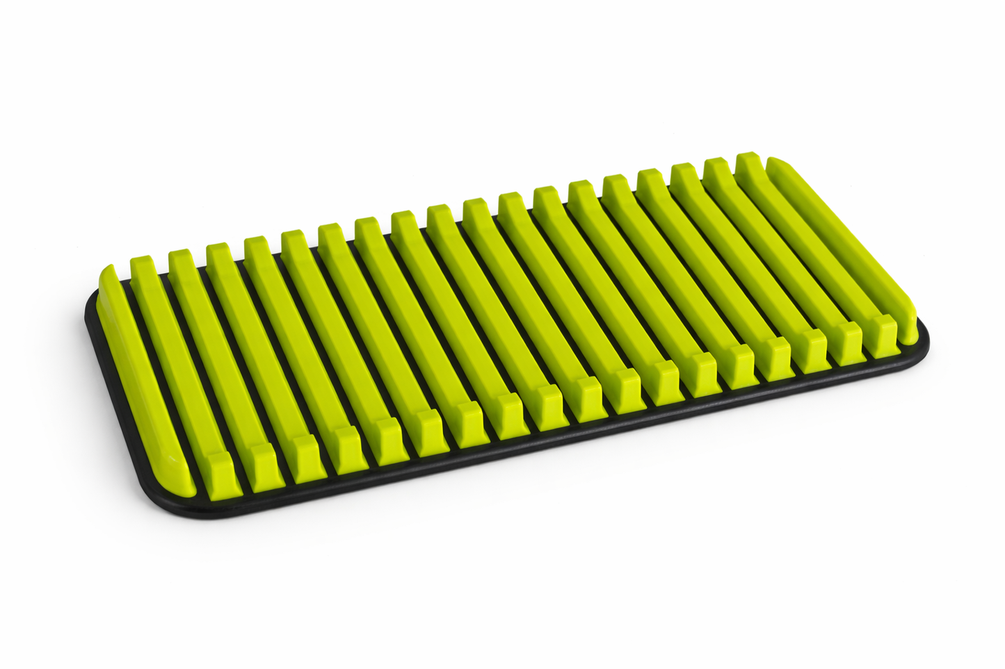 Green pet grooming brush on a white background
