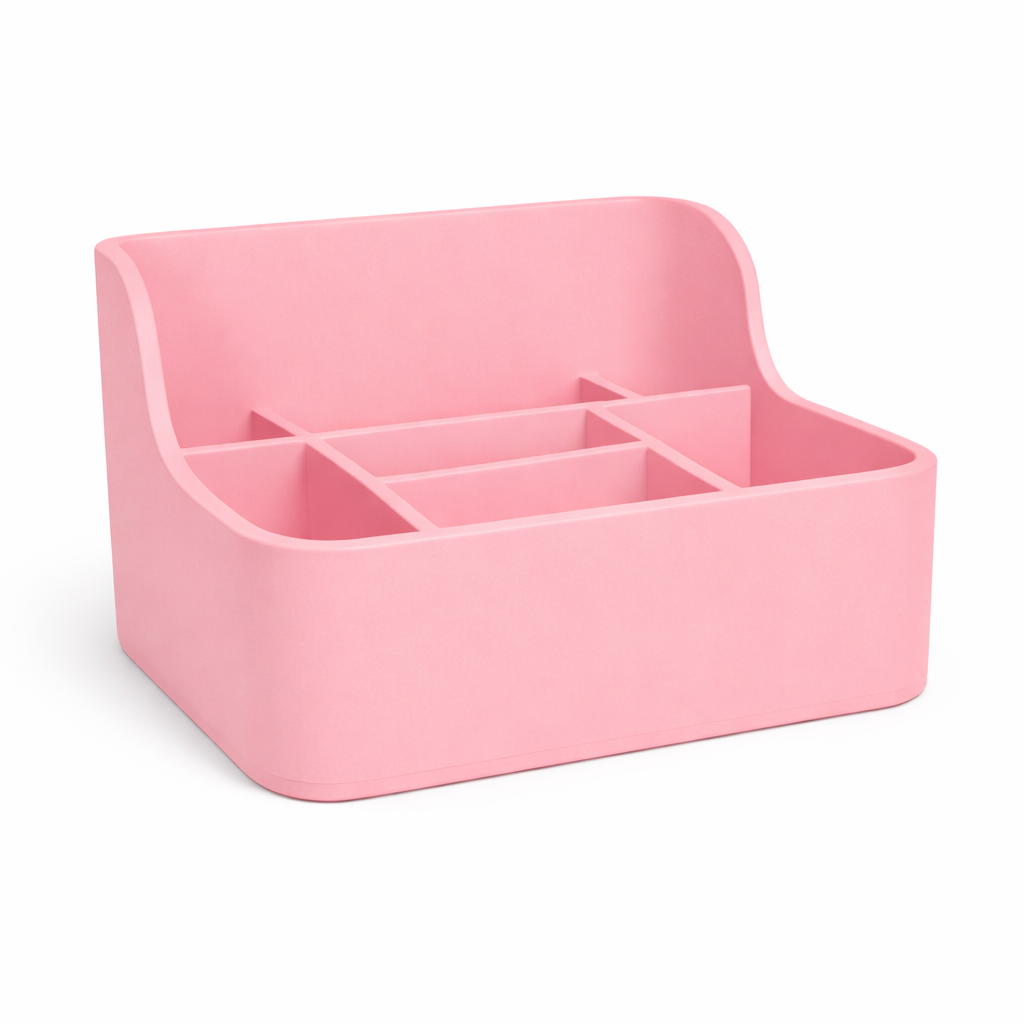Pink desk organizer with compartments on a white background