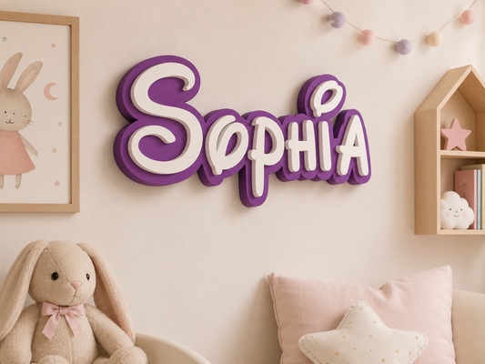 Personalized kids name sign with baby pink base and white raised name lettering for nursery wall decor