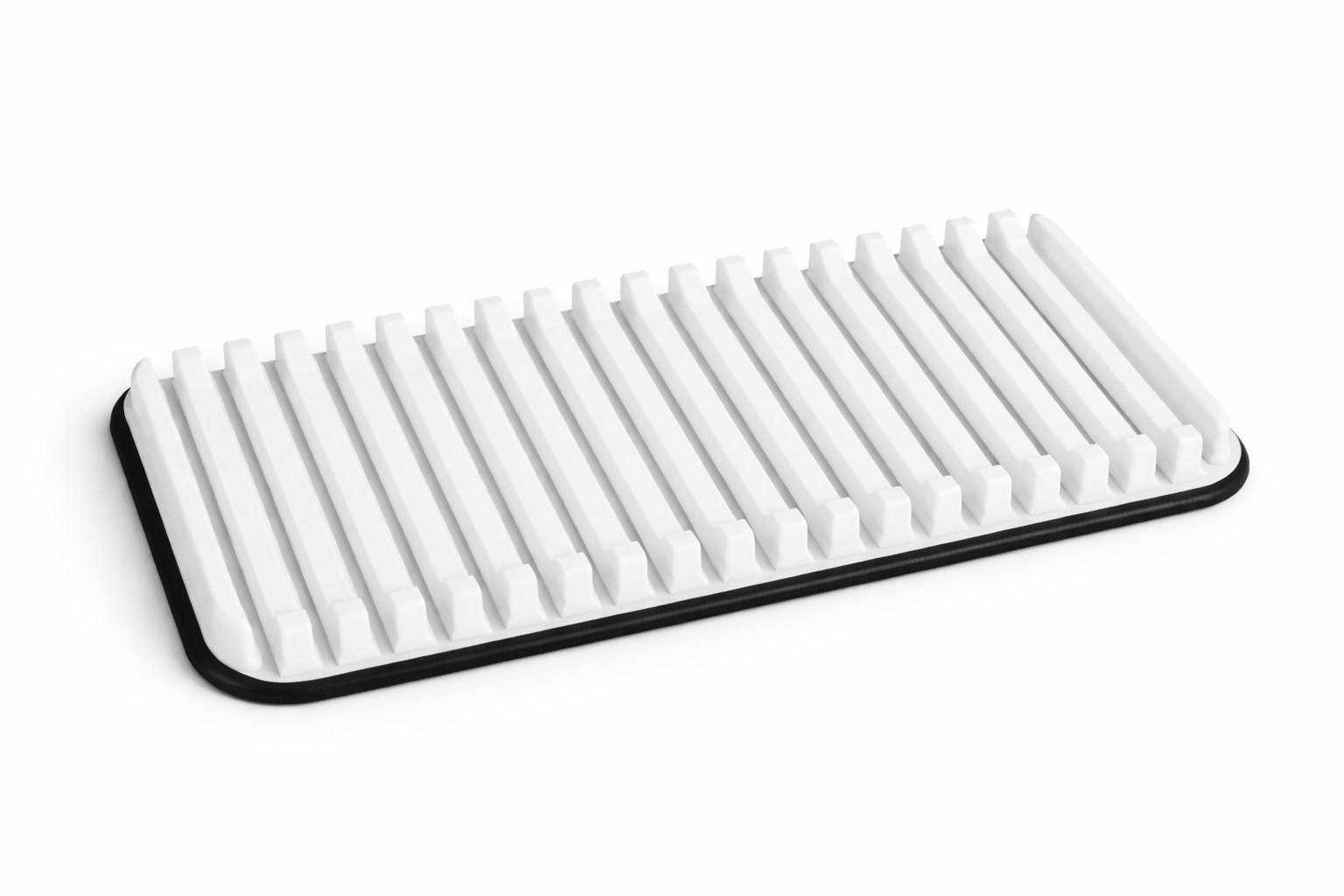 White comb with black handle on a white background