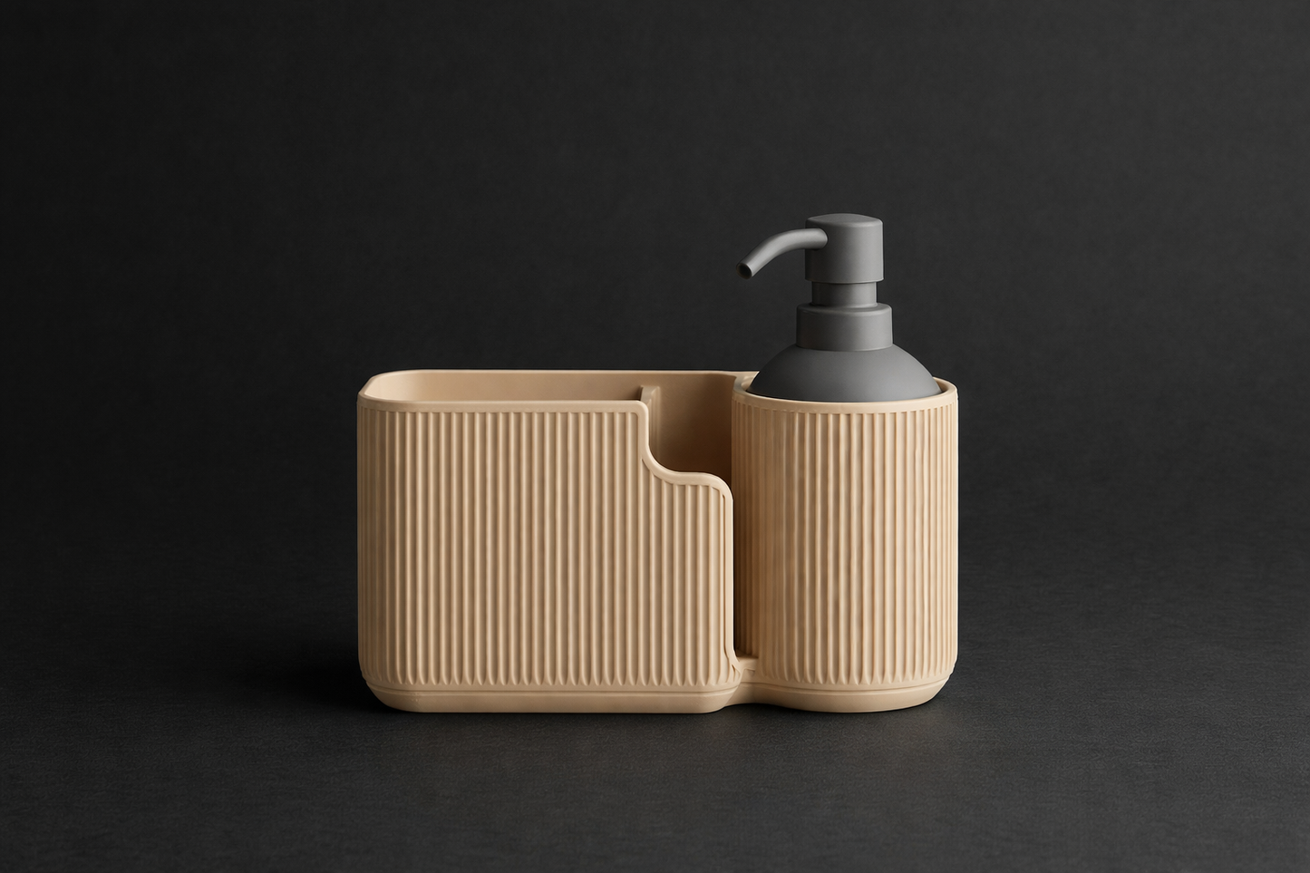 Beige soap dish with textured surface and gray pump dispenser on a black background