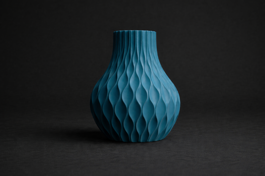 Blue textured vase on a black background