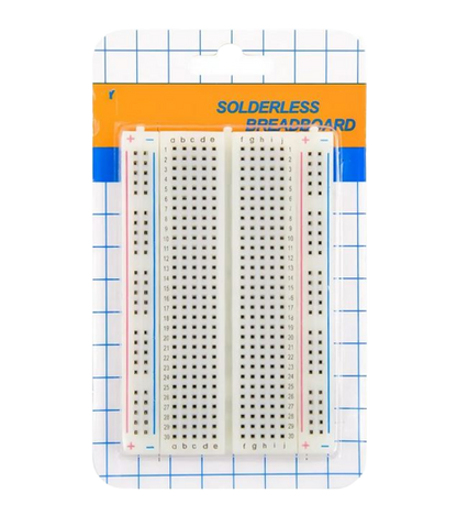 Solderless breadboard with grid lines on a white background