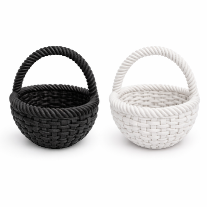 Black and white woven baskets with handles on a white background
