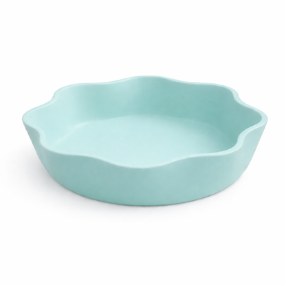 Light blue ceramic dish on a white background