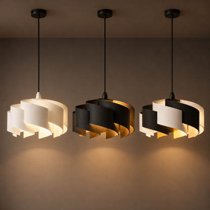 Three modern pendant lights with white and black design on a neutral background