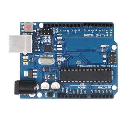 Blue electronic circuit board with various components on a white background